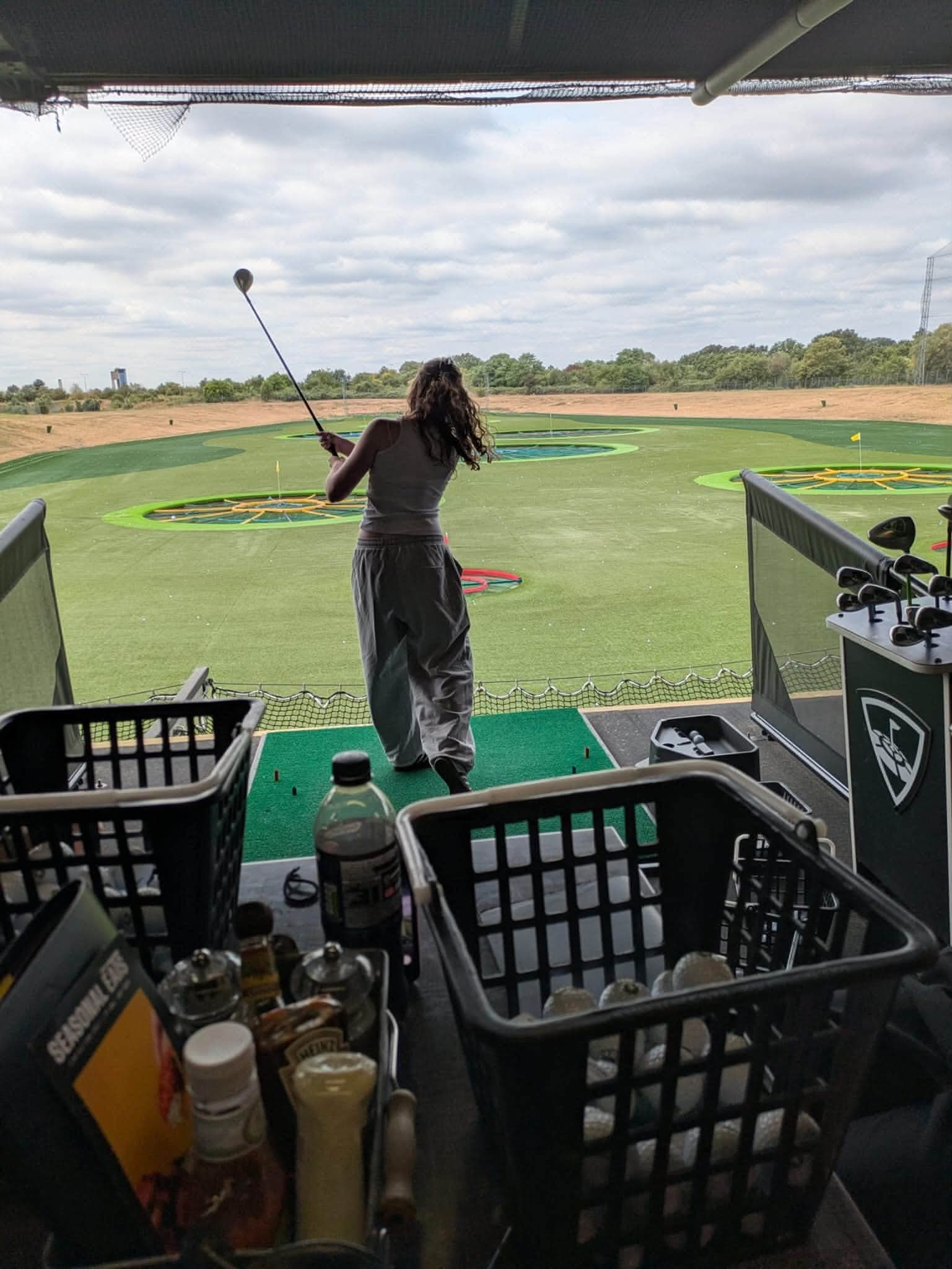 A young person taking a shot at Topgolf during Summer Activities Week 2026